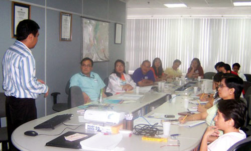 That's me conducting a seminar-workshop for the officers of Optodev, Inc. (an Essilor manufacturing plant) on 17 November 2007