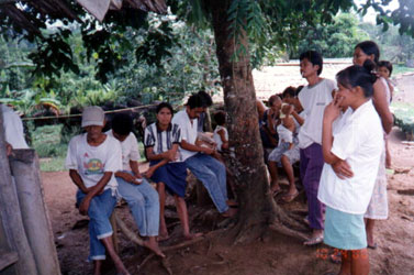 The Dibabawon people dress up like lowlanders, though their feet and hands are calloused by the hardship of living in an upland area.