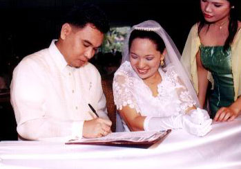 Danny signs our marriage contract