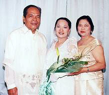 Joy with her mama and papa