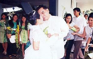 We kiss before letting the doves fly